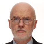 H.E. Mr. Noel White
